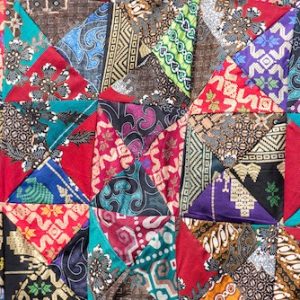 Detail of Vintage clothes for sale inside a shop